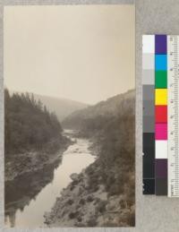 Klamath River Canyon, Humboldt County, California. Looking down river from suspension bridge at foot of seven-mile grade to Orrick. Nov. 1929, E.F