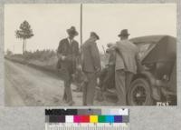 Lloyd Austin, his father, Mr. Keller and the owner of the property outside of Placerville talking over the matter of a purchase