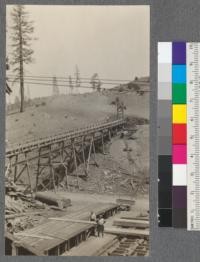 End of sorting table below. Refuse conveyor and pit above. Spanish Peak Lumber Company, Quincy, California. August, 1920. E.F
