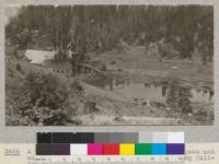 A view from the logging railroad over the pond and mill of the Spanish Peak Lumber Company, near Camp Califorest. July, 1926