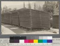 Some neat piling--note wide overhanging roof. Heavy foundations. Low piles. Gray's Flat Yard of the Spanish Peak Lumber Company, Quincy, California. August, 1920. E.F