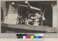 View down a transmission and power take-off in Ventura Mack fire truck, October, 1930. Total cost equipped will be about $4,000, plus labor of deparment men on body construction