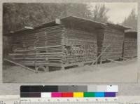 About 30,000 board feet of white oak (mostly Quercus garryana). Cochrane's sawmill, near Wheelbarrow Valley about 8 miles east of Willits, California. Note variety of sizes sawed and poor practice in stacking. June 7, 1922. E.F