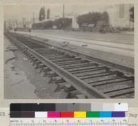 A type of steel cross tie used by East Bay Railway system on Bancroft Way opposite Stadium, between Dana and Telegraph (north track). Steel angle irons with creosoted wood block spacer. The trapezoidal wood block is only for support during pouring of the concrete. See also 5894. Sept. 1935. E. F