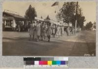 Company Q, 4-H Clubs marching from State Fair Grounds to train to return to Davis, 1930