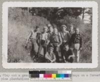 Mr. Clay and a group of Oakland high school boys on a forestry hike in the pine plantations, Berkeley Hills