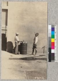 Blowing the lid of a can to demonstrate explosive power of "empty" gasoline containers. As shown by Metcalf and Fairbank, 1929