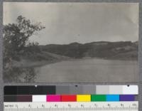 View across Lake San Leandro (Lake Chabot) reservoir of East Bay Water Company from the platform above the dam near Superintendent's residence. December 1919