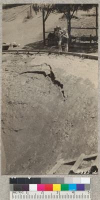 The crack in the south wall of Whitaker's pool about 20 minutes after the intake was completely opened and before the water had completely run out. July and August 1930