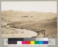 View across Cache Creek bridge near its head showing riddled condition of slopes. Lowdermilk