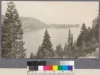 Emerald Bay, Lake Tahoe, from ridge above Cascade Lake. Typical crowns of Red fir & Lodgepole Pine. Note dead fir tops in middle foreground the result of beetle work. W.Met July 1922