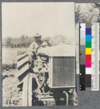 Three views of the first Fordson tractor in the state of California. This was presented by Mr. Ford to Luther Burbank. In this tractor, the air is clarified by passing it through water before it goes to the carburetor. It has, however, one danger point in that the end of the exhaust pipe is only a few inches above the ground