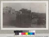 Loading and shipping 4 1/2 tons of California grown cork (stripped in July and August 1940) from San Francisco by vessel to Baltimore, Maryland, for testing