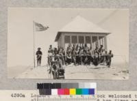 Lookout McGee at Buck Rock welcomed the 4-H club visitors and showed how fires are located and reported. Metcalf. July, 1928