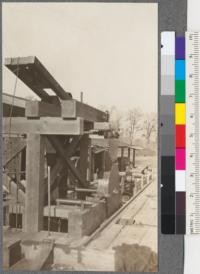 The Coffey & Melville Mill in course of erection. Single circular mill (with top saw). Rope drive carriage. Willits, California. April, 1920. E.F