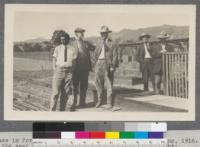 Class in Forestry 106, artificial reproduction, spring, 1916. At the seed beds in the forest nursery. Left to right: Hall, Hansen, Sanford, Aylward and Smith