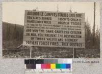 Fire sign at edge of burn of August 1, 1922. Fire burned 897 acres in 6 days. Period of high humidity and fall in temperature large factor in putting out