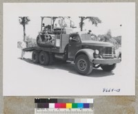 Bulldozer outfit on carrier truck. California Department of Forestry Sutter Creek Ranger Station. July 1952. Metcalf