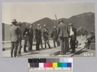 The Ventura-Santa Barbara group listen to an explanation of the lysimeteres by Don Sinclair. The big-ones are under the shed in the background. Typical brush covered slopes of San Dimas Experimental Forest