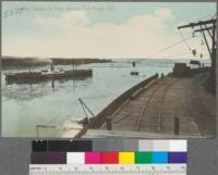 Loading lumber in Noyo Harbor, Fort Bragg, California