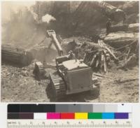 Redwood logging. An RD8 Caterpillar tractor delivers a log to the loader. Monument Creek operation. Pacific Lumber Company. Scotia, California. Aug. 1937. E.F. See also 6445-6