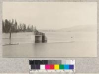 Lake Almanor from the dam built by the Great Western Power Company to make this large artificial lake. The trees on its edges are dying from the change in water level, yellow pines seeming to resist flooding longer than other species. July, 1922