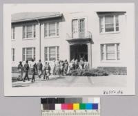 Group going into a session in Horticultural Building during 4-H Club Convention. Metcalf. August 1952