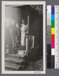 Mr. and Mrs. Jean Dietz of Madison, Wisconsin - friends of Fred Trenk on the steps of their cottage at Pine Lake, near Hurley, Wis. Oct. 1950. Metcalf