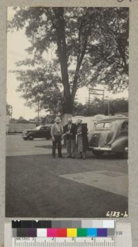 Some of the crew at a stop in Oregon under black locust. 1937. Metcalf