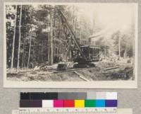 American railroad ditcher traveling on curve