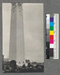 A view of the Campanile from the roof of Hilgard Hall, Charter Day, March 23, 1918, with service flag flying beneath the clock