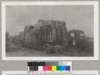 Loading and shipping 4 1/2 tons of California grown cork (stripped in July and August 1940) from San Francisco by vessel to Baltimore, Maryland, for testing