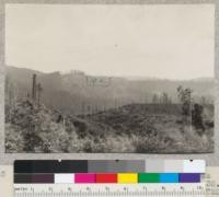 View across north fork Eel River, across Camp Grant to Pacific Lumber Company cuttings of 1928-30. University of California experimental plot, NW 1/4 NE 1/4 Sec. 1 T2S R2E, 1/4 mile to right of straight line along Hammond Lumber Company timber. See also #5546. 8-6-32. E.F