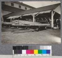 Crude trucks for hauling lumber from sorting table to air drying yard, St. Maurice Lumber Company, Three Rivers, Quebec. 1919