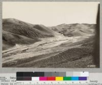 Tehachapi Flood Area. September 30, 1932. Detail view of head of a tributary of Cache Creek. Former heavy rains in recent years has started the large gullies but practically all small gullies were produced by the storm of Sept. 30, '32