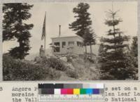 Angora Peak Lookout Station is set on a moraine ridge overlooking Fallen Leaf Lake, the Valley and Myers. Eldorado National Forest. W. Metcalf - July 1931