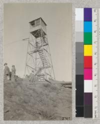 The 40-foot steel lookout tower on Grizzly Peak, built under the auspices of the Contra Costa Hills Fire Protection Committee. The electric siren is shown just below the house