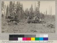 Showing Best-60 tractor pulling a Robinson hydraulic lift big wheel. The load consists of about 2000 board-feet log scale and the tractor made the round trip of about 1000 feet to the landing in 19 minutes. Clover Valley Lumber Company near Camp 8. August, 1925