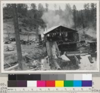 The Miller Mill on road between Redwood Highway and Fruitland, Humboldt County, California. Cutting D.F. Circular head rig; hand set carriage, artificial pond. July 17, 1947. E. F