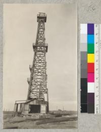 A 122' wooden oil well derrick. The derrick foundation and pump house contain between 40 and 50 thousand feet of lumber, most of it of a high common grade. The derrick here pictured is not yet complete. Bakersfield, California. 1927