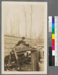 The filer. The filer had his bench in the woods at the dinner shack which saved carrying the saws two miles into camp