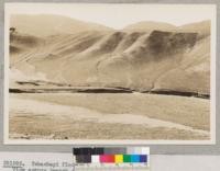 The garbage incinerator and the bear pits at Giant Forest. The garbage is brought here every day at 4 and what the bears do not eat is burned that evening. Metcalf. July, 1928