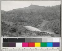 A monitor stream of water at a mine along Trinity Highway, California, May 1941. Metcalf