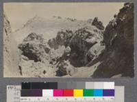 Two of the main gas vents in the bottom of the present crater-floor; too hot for comfort, and covered with sulfur from the suffocating sulfur dioxide gas. June 19, 1918