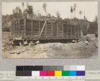 A car of split redwood grape stakes. Sherwood Home near Willits, California. April 1921, E.F