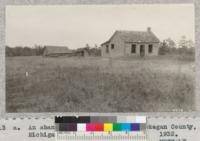 An abandoned farm in eastern Muskegan County, Michigan, on a sandy plain area. 1932. Metcalf