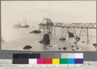 Loading wharf and chute of Pollard Lumber Company. Loading railroad ties for Westport Tie Company. Westport, Mendocino, California. May 1920. E. F