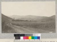 Farming the steep hillsides with no provision for soil cover during the rainy season results in floods and soil impoverishment. Metcalf. June, 1927