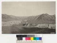 Destruction of a mountain valley by gulley erosion. Along the State Highway between Castaic and Gorman. - Tehachapi Mountains. 1937. Metcalf