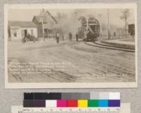 American railroad ditcher laying its own track for moving